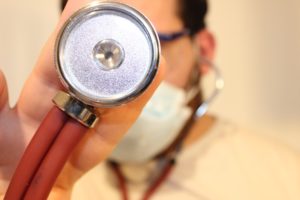 Doctor holds a stethscope